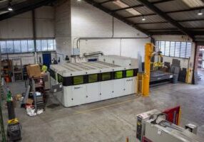 Aerial photo of new CNC lazer cutting machine in Leeds at PC Fabrications